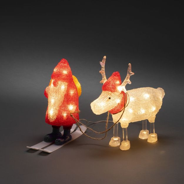 Konstsmide Lumières de Noël - Père Noël et rennes - 23 x 9 x 23,5 cm - IP44 - transparent et rouge